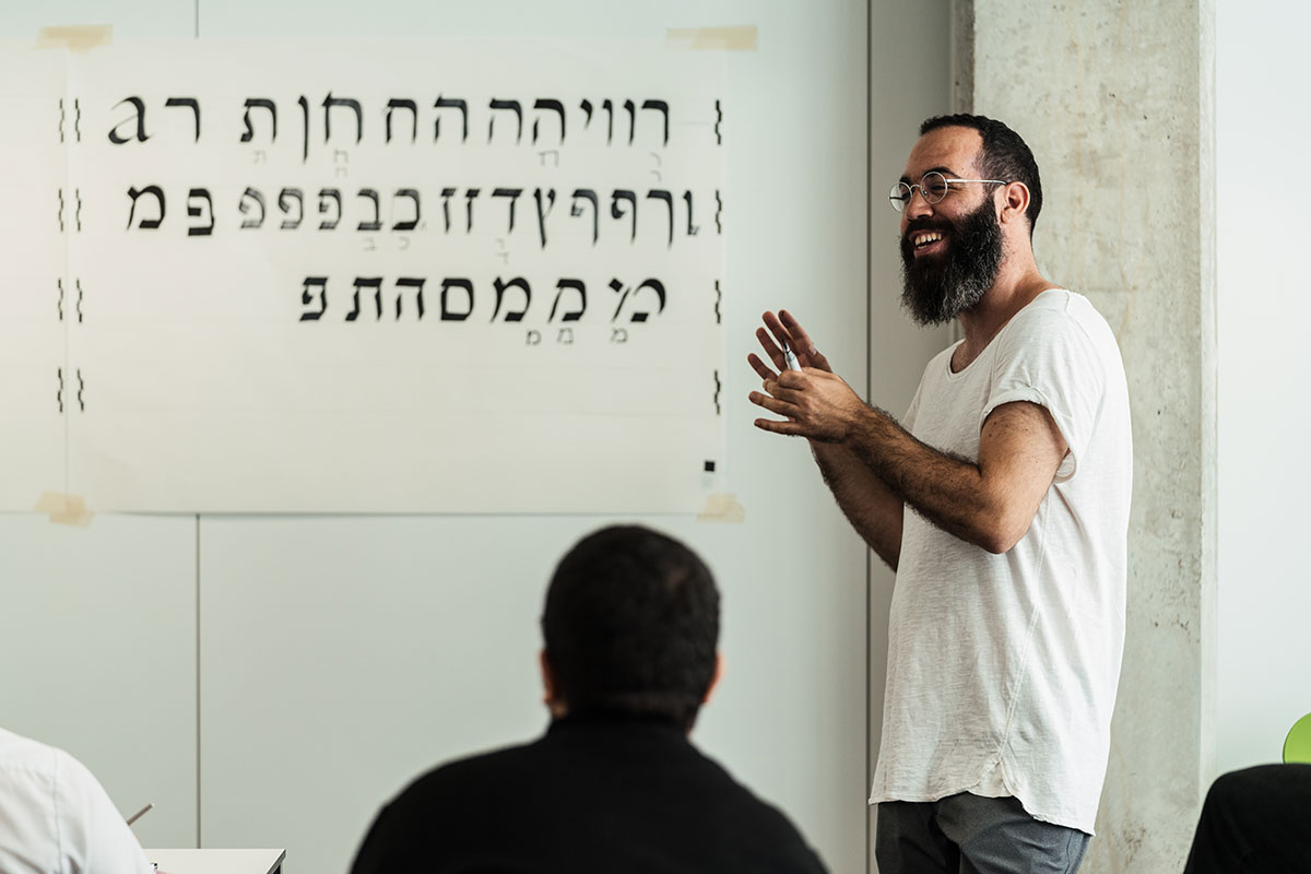 Meir Sadan teaching about the Hebrew script